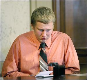 Michael Fay, 18, is eligible for parole after 60 years, Judge Randall Basinger decided. 
