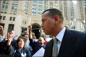 New York Yankees' Alex Rodriguez arrives at the offices of Major League Baseball, in New York in October.