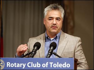 Zach Leroux, manager of the Toledo Assembly Complex, speaks during a meeting of the Rotary Club at the Park Inn in Toledo. He said Chrysler wants to make more than 506,000 vehicles in Toledo in 2014.