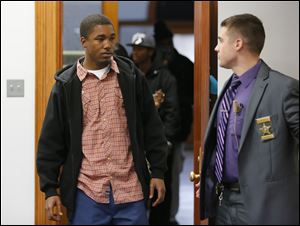 Carl Steward, 21, of Toledo arrives for his sentencing on five counts of dog fighting.