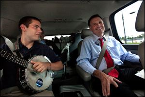 Then Democratic gubernatorial candidate Creigh Deeds spends time with his son Gus, left, on the road to Halifax, Va., between campaign events in September, 2009.