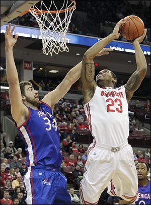 Ohio State's Amir Williams, who had a career-high 16 points, shoots over American's Tony Wroblicky.