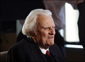 Billy Graham, shown here in 2010, has been returned home after hospital tests.