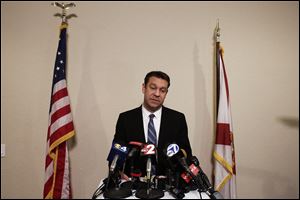 Congressman Trey Radel addresses the media at his office in Cape Coral on Wednesday night.