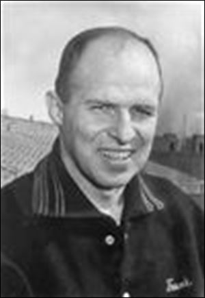 Frank Lauterbur had a record of 48-32-2 in eight seasons as UT football coach.