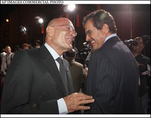 Producer Arnon Milchan, left, and C.O.O. and President of News Corporation Peter Chernin arrive at 