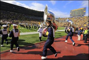 University of Michigan marching band taking the field this year. Wolverines fans may face strongest-ever minority of OSU fans present for The Game this Saturday.