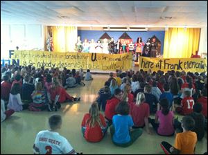 After the play by the Perrysburg High School students, the Frank Elementary and high school students sang an anti-bullying song with their motto: F is for friends who stick up for each other. U is for you and me, and N is for nobody deserves to be bullied. 