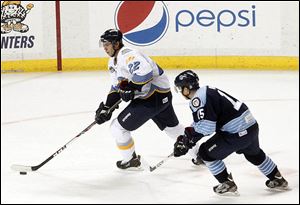 The Walleye's Russ Sinkewich takes control of the puck.