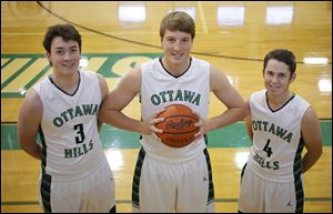 Ottawa Hills players, from left, Geoffrey Beans, R.J. Coil, and Ben Silverman return from a team that advanced to the Division IV regional final last March. All three are seniors.