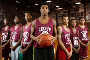 The returners to the Scott basketball team this season, from left: Chris Darrington, Jay Wells, Tray Brown, Percy Bogan, Chris Harris, Larry Green, and Malik Brooks. 