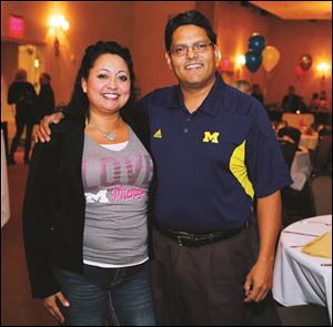 Linda Alvarado and Roman Arce during the Epilepsy Center tailgate party.