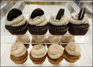 A Cake in a Cup kiosk store in Franklin Park Mall sells the Sylvania Township bakery’s four most popular cupcakes. The business won ‘Cupcake Wars’ in 2011.