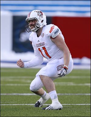 Bowling Green quarterback Matt Johnson celebrates a touchdown during the third quarter.