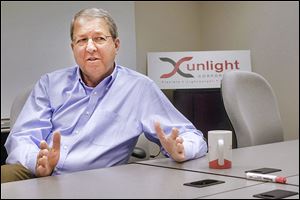 Xunlight Corp. President John Buckey says the changes the company plans will cut its costs by 38 percent and decrease its production time. The firm has failed to pay some of its vendors and has struggled to fill orders.