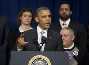 President Barack Obama speaks about the new health care law at the South Court Auditorium in the Eisenhower Executive Office Building on the White House complex.