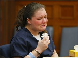 Angela Steinfurth, mother of Elaina Steinfurth, cries during her hearing in Lucas County Common Pleas Court, Tuesday.