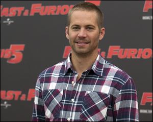 Paul Walker posing during the photo call of the movie 