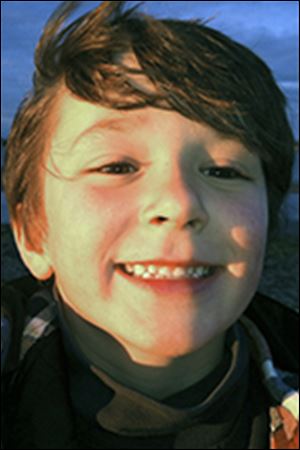 This autumn 2011 photo provided by the Jesse Lewis Choose Love Foundation shows Jesse Lewis, who was slain in the shooting at Sandy Hook Elementary School on Dec. 14, 2012, in Newtown, Conn. Jesse's mother Scarlett Lewis said Friday, Oct. 18, 2013, that Jesse yelled for classmates to run when the gunman paused to reload during the shooting spree. The gunman then shot the boy in the head. Scarlett Lewis said investigators detailed the events inside her sonís classroom after gathering accounts from children who survived. (AP Photo/Jesse Lewis Choose Love Foundation, Scarlett Lewis)