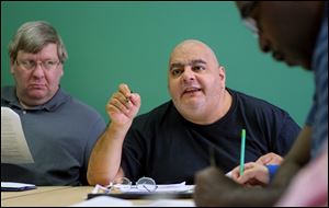 Mark Sahadi makes a point in a diabetes support class. He says he learns something each week that helps him understand both mental illness and diabetes.