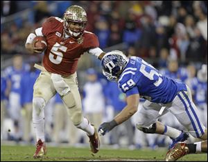 Florida State's Jameis Winston (5) is among six finalists for the Heisman Trophy.