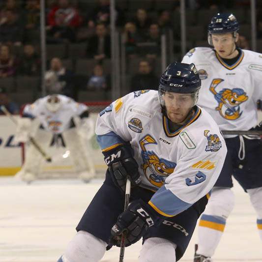 C-J-Chartrain-3-pushes-the-puck-toward-the-Cyclones-goal-during-the-first-period