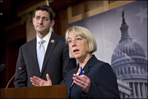 House Budget Committee Chairman Paul Ryan, R-Wis., left, and Senate Budget Committee Chairwoman Patty Murray, D-Wash., announce a tentative agreement between Republican and Democratic negotiators on a government spending plan, at the Capitol in Washington, Tuesday.