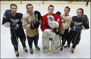 St. John's hockey players from left: Ian Rapp,  Dominic Horvath, Mike Barrett, Ben Hamilton and Caleb Hauenstein.'s