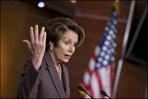 House Minority Leader Nancy Pelosi of Calif. speaks about the pending bipartisan budget compromise struck by House Budget Committee Chairman Rep. Paul Ryan, R-Wis., and Senate Budget Committee Chair Sen. Patty Murray, D-Wash., Thursday during a news conference on Capitol Hill in Washington. 