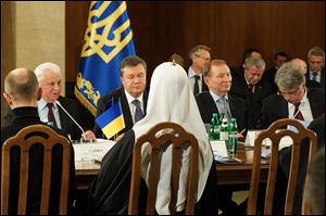 Ukraine's political, government, opposition and religious leaders at a round-table meeting, facing from left to right:  ex-president Leonid Kravchuk, current president Viktor Yanukpvych,  ex-president Leonid Kuchma, ex-president Viktor Yushchenko in Kiev, Ukraine today.