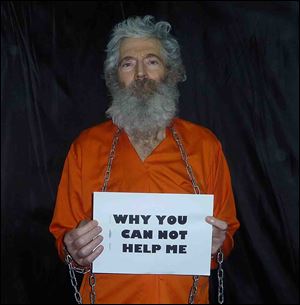 This photo provided by the family of Robert Levinson, shows retired-FBI agent Robert Levinson in a photo the family received in April 2011. 