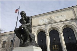 The Thinker, a sculpture by Auguste Rodin is seen outside the Detroit Institute of Arts.