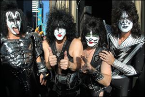 From left, Gene Simmons, Paul Stanley, Eric Singer, Tommy Thayer of KISS in October, 2012. The group is part of teh 2014 Rock and Roll Hall of Fame class.