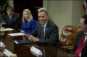 President Barack Obama meets with technology executives in the Roosevelt Room the White House in Washington, today.