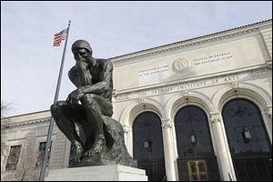 The Detroit Institute of Arts in Detroit, The Thinker, a sculpture by Auguste Rodin is seen outside the art museum. 