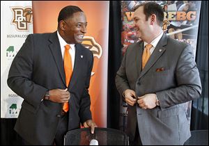 Dino Babers, left, is introduced by Falcons athletic director Chris Kingston after being named 18th football coach in BG history during a news conference Thursday at the Stroh Center.