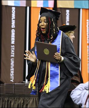 Ashley Edwards of Detroit graduates with a bachelor of arts degree in film during Bowling Green State University’s winter commencement ceremonies at the Stroh Center on campus.