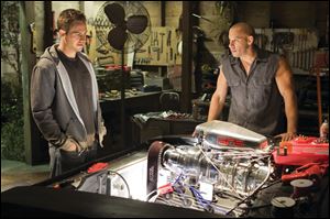 Paul Walker, left, and Vin Diesel, are shown in a scene from 