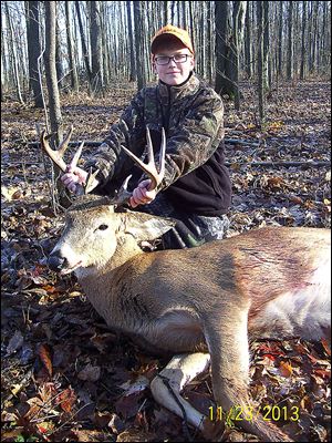 Lance Boyers, 11, a fifth grader at Maplewood Elementary School in Sylvania, harvested this 12-point buck while hunting in Defiance County with his dad in November. The rack of the trophy will soon be hanging somewhere in the family’s home.