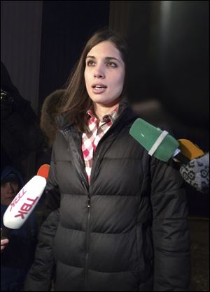 Nadezhda's Tolokonnikova speaks to the media after leaving a prison in Krasnoyarsk, Russia today.