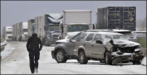 A long line of trucks waits for hours as the debris from the I90 pile-up is cleared.