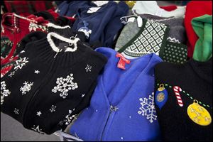 Selections of holiday wear for sale at Alley Vintage & Costume shop, in Columbus.