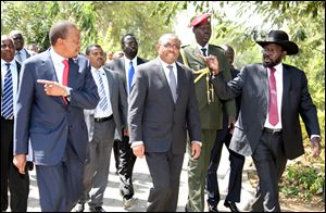 Ethiopian Prime Minister Hailemariam Desalegn, middle, South Sudanese President Salva Kiir, right, and Kenyan President Uhuru Kenyatta  before their meeting at State House in Juba, South Sudan, today.
