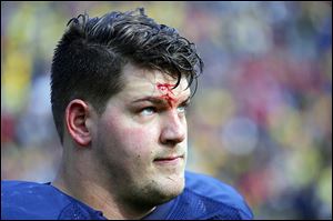 Offesive lineman Taylor Lewan will play his final game with the University of Michigan today, just a few miles from where he improved his grades enough in high school to go to college.