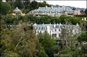 Chateau des Fleurs, at bottom, is nearing completion in Bel-Air, already home to the rich and famous. At 60,000 square feet, it is still not the biggest home in Los Angeles, but it’s nothing to sneeze at. 