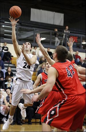 Perrysburg's Nick Moschetti, who had 28 points, shoots against Bedford on Friday. He has scored at least 20 in five of six games.