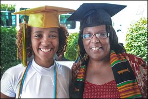 A family photo shows Tracee Ellis, right, and her daughter, Kayla Lindsey, at a joint graduation party in 2008. Ms. Ellis graduated from the University of Toledo in May of that year, and her daughter graduated from Start High School a month later. 