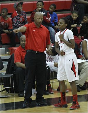 Rogers coach Lamar Smith directs Sasha Dailey. The Rams played some of the nation’s top teams this week at a tournament in Naples, Fla.
