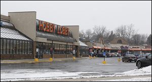 The Monroe Street Market Square shopping plaza, which is anchored by Hobby Lobby, has been sold to Devonshire REIT.