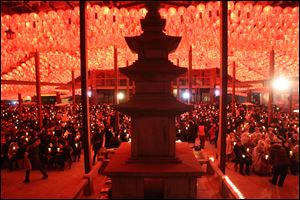 Buddhists attend New Year's Eve celebrations at the Bongeun Buddhist temple in Seoul, South Korea.